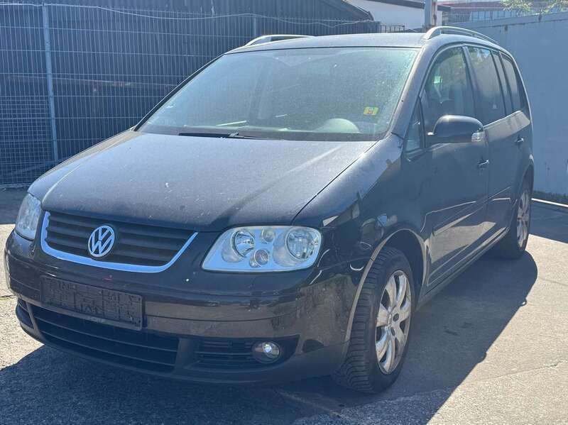 Deep black perleffekt Gebraucht 2006 VW Touran Highline Van / Kleinbus | 1.699 € (Fairer Preis) - Bild 1/4