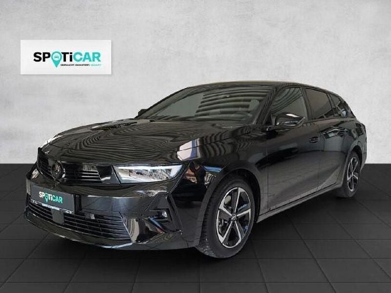 Karbon schwarz Gebraucht 2024 Opel Astra Kombi | 26.990 € (Fairer Preis) - Bild 1/4