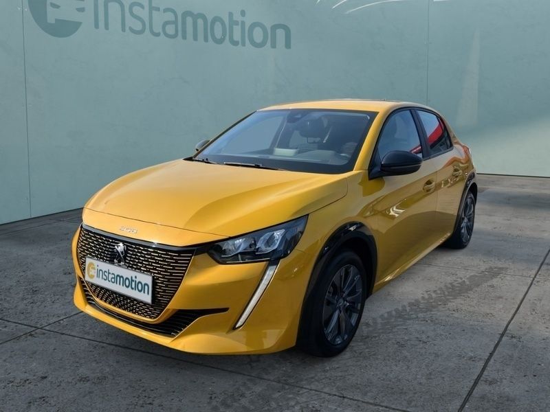 Gelb Gebraucht 2022 Peugeot e-208 Active Kleinwagen | 19.940 € (Teuer) - Bild 1/3