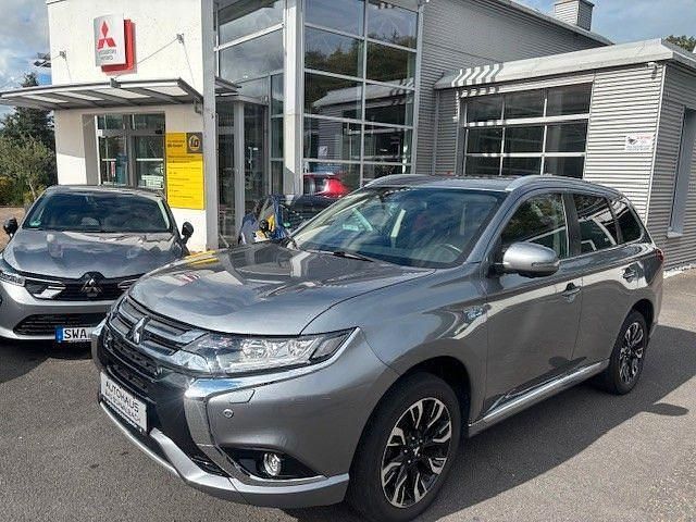 Grau Gebraucht 2018 Mitsubishi Outlander P-HEV Top SUV | 17.990 € (Guter Preis) - Bild 1/3