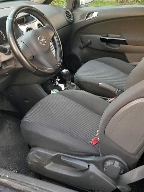 Second-hand Opel Corsa 60 CP (44 kW) 2009 Albastru Hatchback