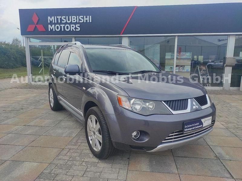 Grau Gebraucht 2009 Mitsubishi Outlander Plus SUV | 8.990 € (Teuer) - Bild 1/4
