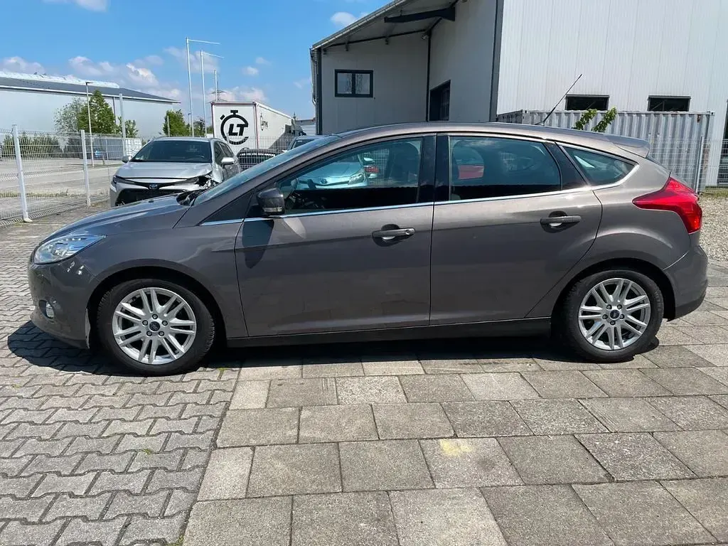 Gebraucht Ford Focus Titanium 125 PS (91 kW) 2012 Braun Limousine