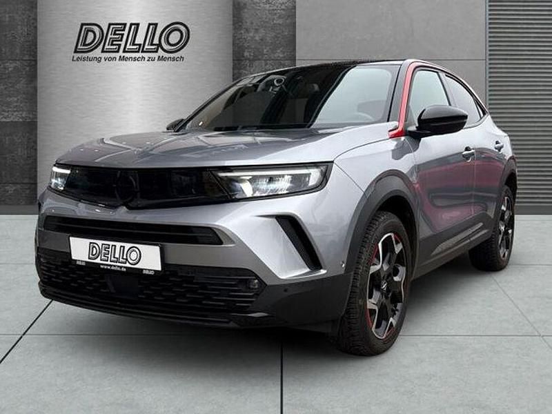 Gebraucht Opel Mokka 131 PS (96 kW) 2021 Kontrast grau/quarz silber SUV