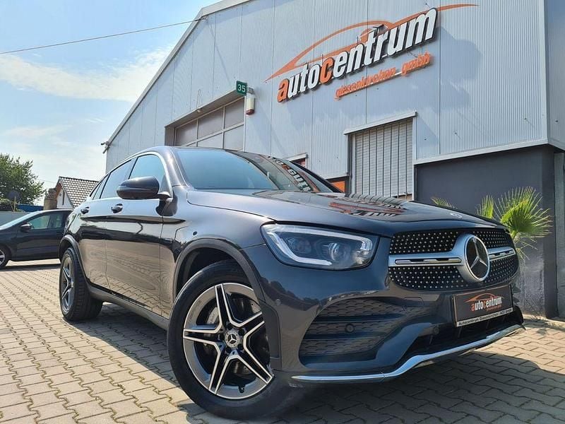 Grau Gebraucht 2020 Mercedes GLC300e AMG Limousine | 47.490 € - Bild 1/4