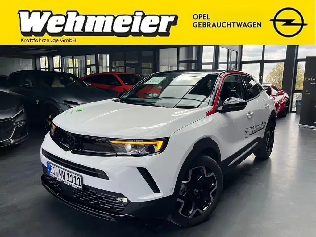 Gebraucht Opel Mokka-e 100 kW (136 PS) 2023 Jadeweiss SUV