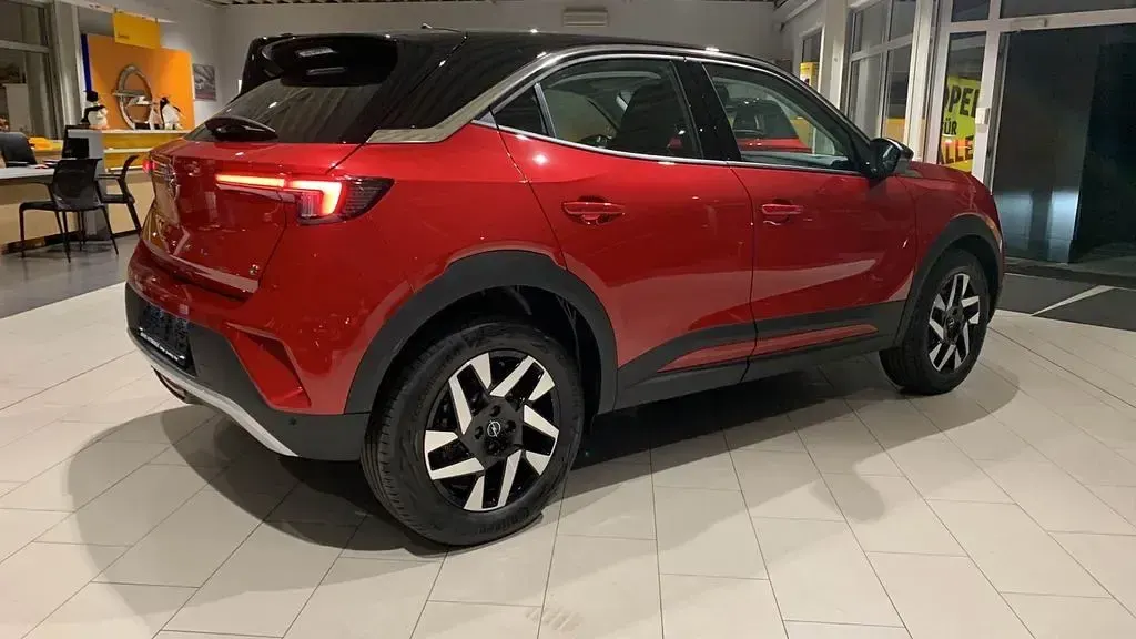 Gebraucht Opel Mokka-e Elegance 100 kW (136 PS) 2023 Kardio rot (metallic) SUV