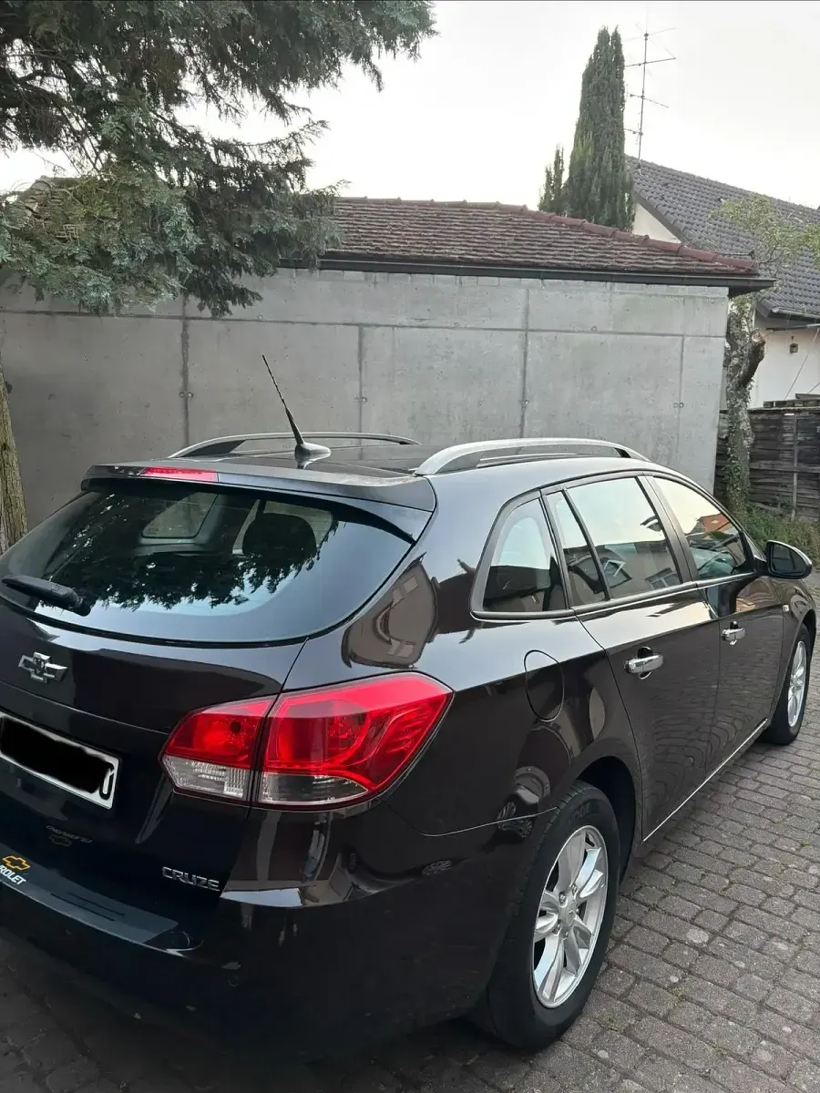 Gebraucht Chevrolet Cruze LT 131 PS (96 kW) 2012 Braun Kombi
