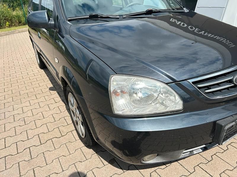 Grau Gebraucht 2004 Kia Carens 2 Van / Kleinbus | 500 € (Guter Preis) - Bild 1/4