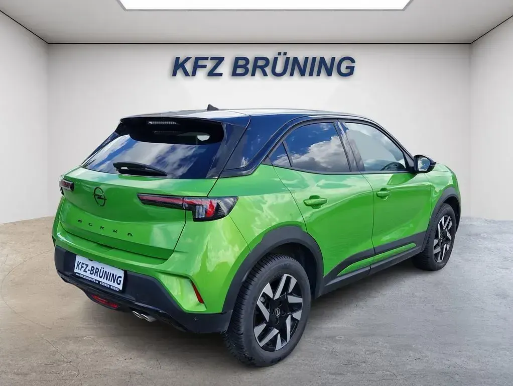 Gebraucht Opel Mokka 136 PS (100 kW) 2024 Matcha grün metallic / dac (metallic) SUV