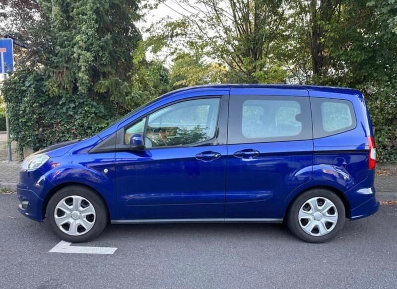 Blau Gebraucht 2014 Ford Tourneo Courier Trend Van / Kleinbus | 4.950 € (Fairer Preis) - Bild 1/4