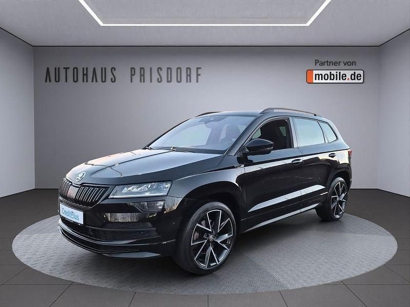 Schwarz Gebraucht 2022 Skoda Karoq SportLine SUV | 30.950 € (Guter Preis) - Bild 1/4