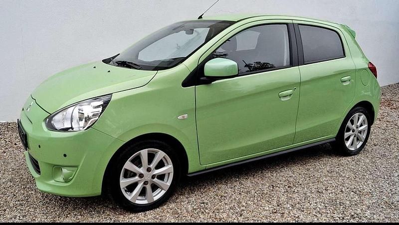 Gebraucht Mitsubishi Space Star 80 PS (58 kW) 2013 Grün Limousine