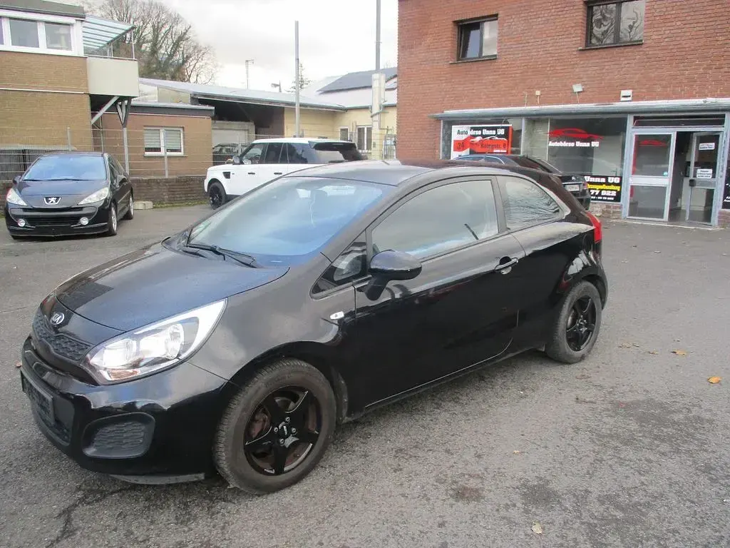 Gebraucht Kia Rio Attract 75 PS (55 kW) 2015 Schwarz Limousine