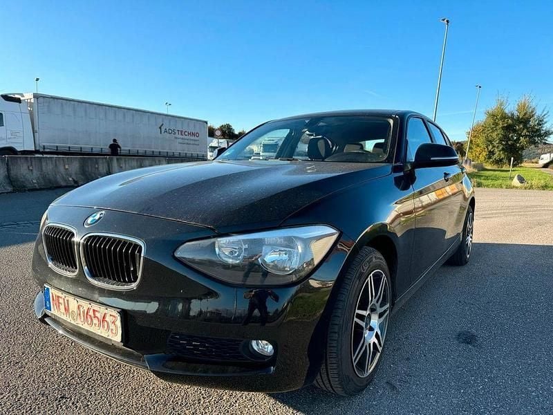 Schwarz Gebraucht 2013 BMW 116 Comfort Edition Kleinwagen | 6.100 € (Guter Preis) - Bild 1/4