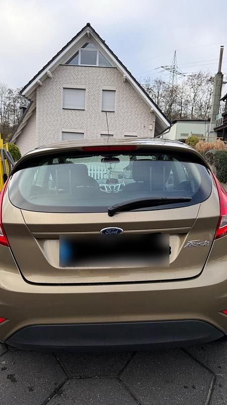 Gebraucht Ford Fiesta 85 PS (62 kW) 2012 Gold Kleinwagen