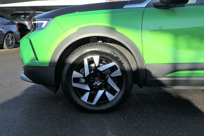 Gebraucht Opel Mokka-e Elegance 100 kW (136 PS) 2023 Matcha green SUV