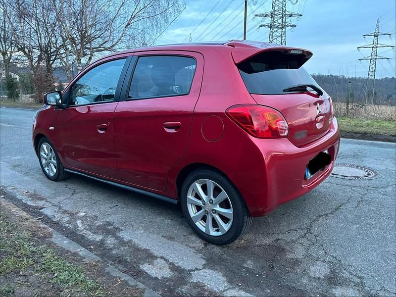 Gebraucht Mitsubishi Space Star 80 PS (58 kW) 2014 Rot Van / Kleinbus