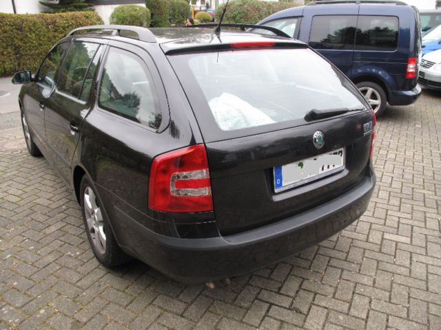 Gebraucht Skoda Octavia Ambiente 105 PS (77 kW) 2007 Schwarz metallic Kombi