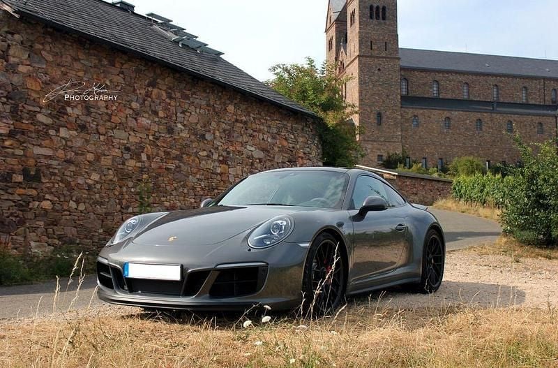 Grau Gebraucht 2019 Porsche 911 Carrera 4 GTS Coupé | 110.000 € (Fairer Preis) - Bild 1/4