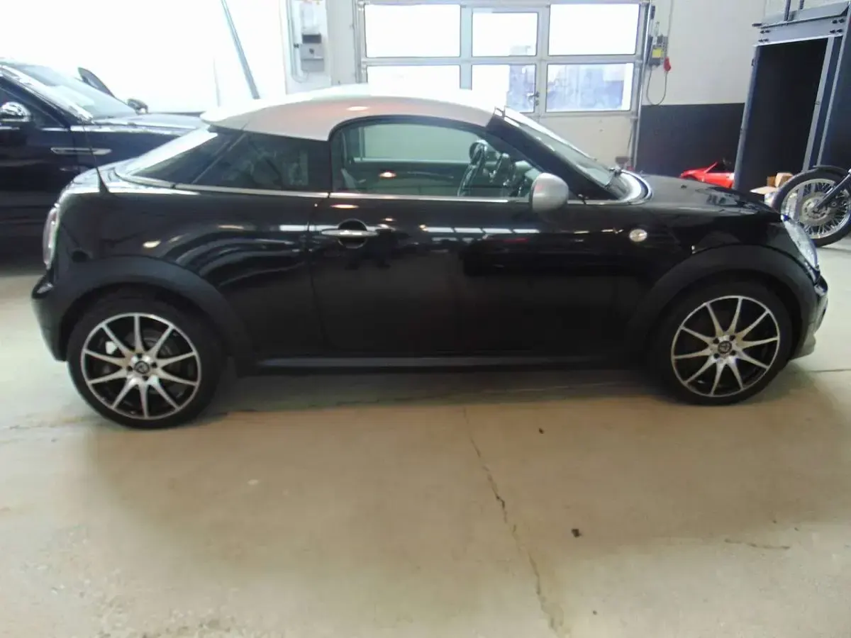 Gebraucht Mini Cooper Coupé 122 PS (89 kW) 2012 Midnight black metallic Coupé