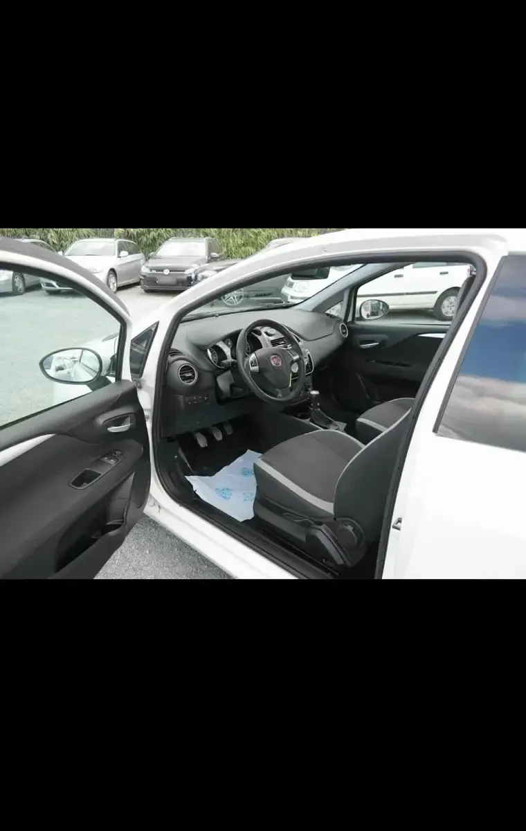 Gebraucht Fiat Punto Evo 69 PS (50 kW) 2012 Weiß Kleinwagen