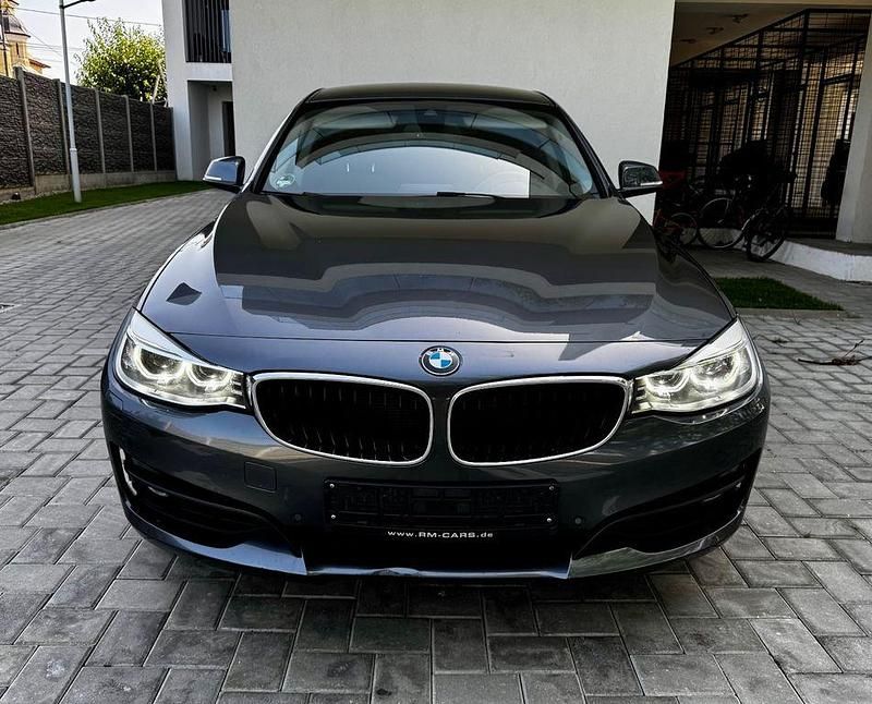 Grau Gebraucht 2013 BMW 320 Gran Turismo Sport Line Limousine | 9.200 € (Fairer Preis) - Bild 1/4
