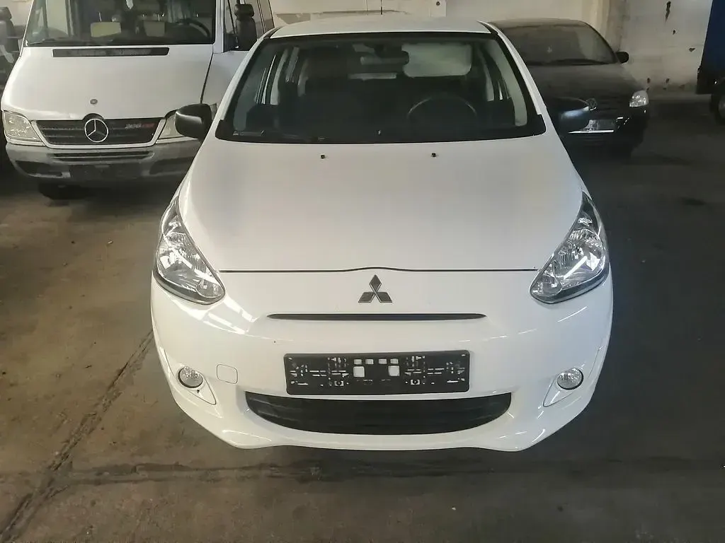 Gebraucht Mitsubishi Space Star 71 PS (52 kW) 2015 Weiß Limousine