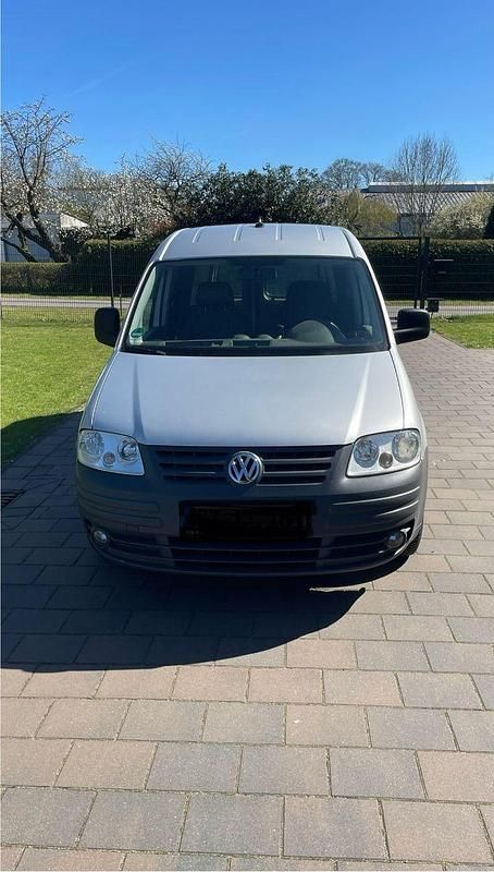 Second-hand VW Caddy Maxi 105 CP (77 kW) 2009 Argintiu Monovolum