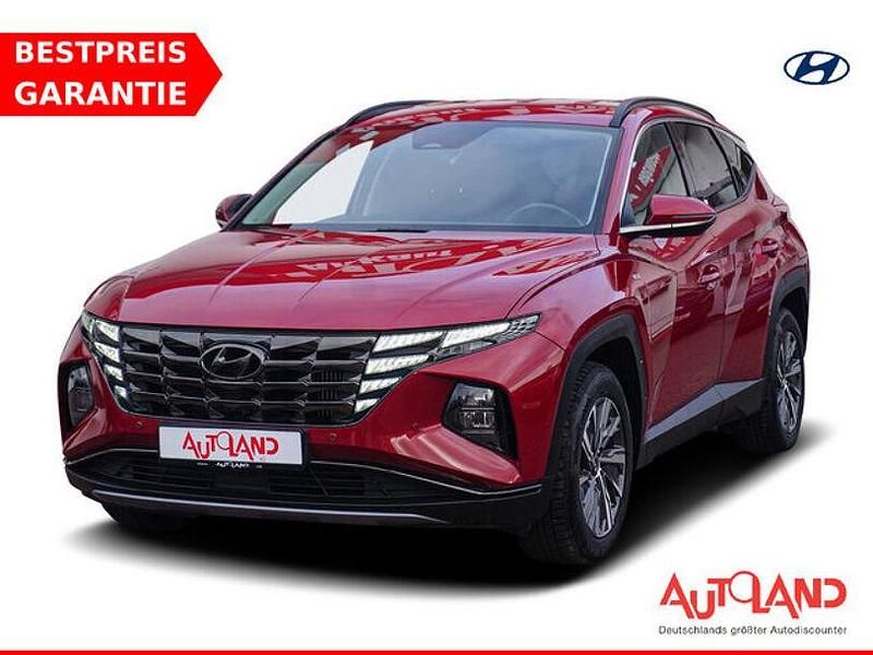 Sunset red metallic Gebraucht 2021 Hyundai Tucson SUV | 25.990 € (Etwas zu teuer) - Bild 1/4