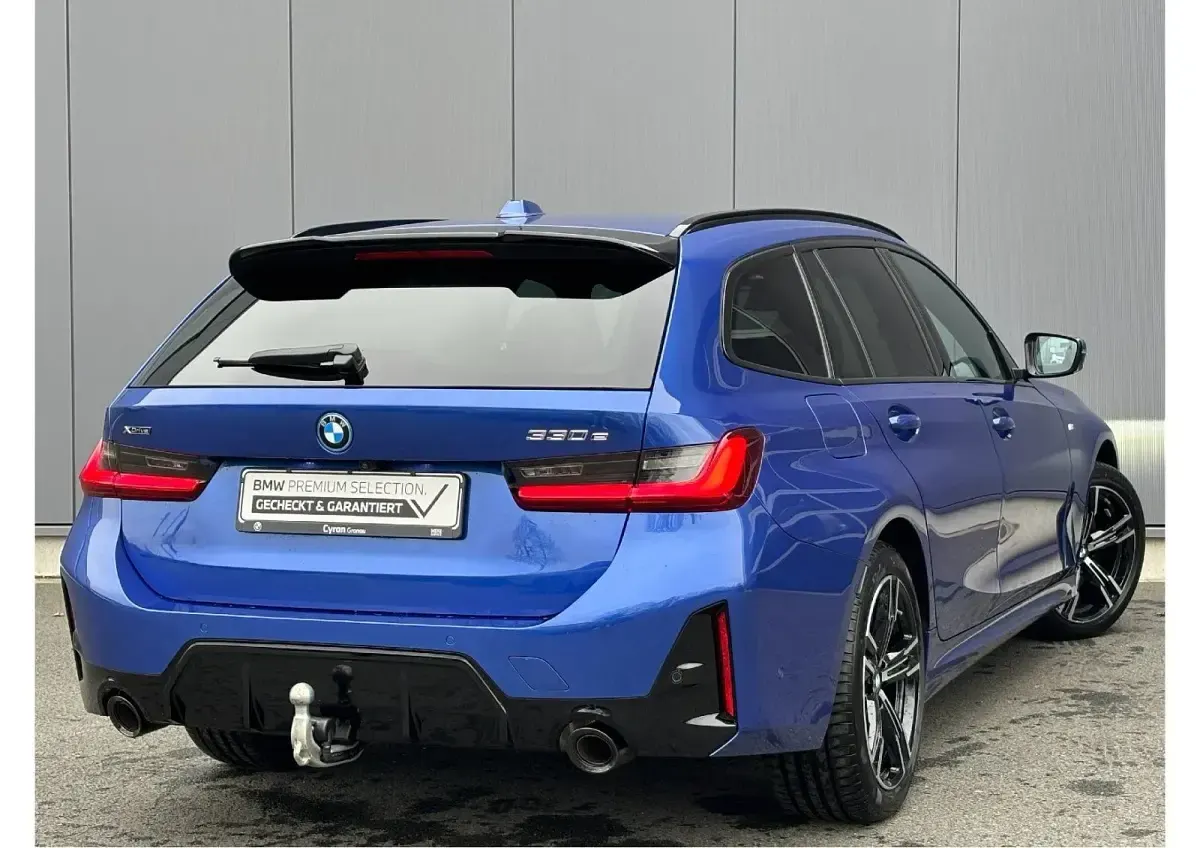 Gebraucht BMW 330e Comfort Edition 292 PS (214 kW) 2024 Blau Kombi