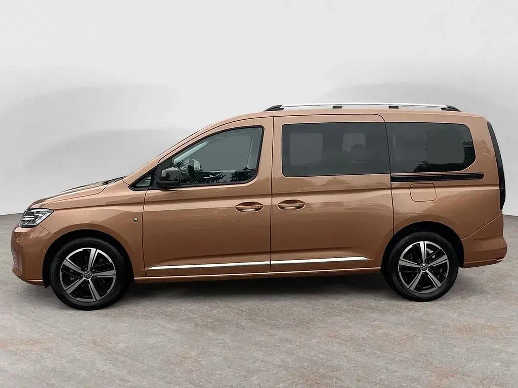 Używany VW Caddy Maxi Style 114 KM (83 kW) 2023 Brązowy Minivan