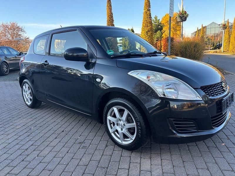 Schwarz Gebraucht 2012 Suzuki Swift Club Kleinwagen | 4.990 € (Fairer Preis) - Bild 1/4