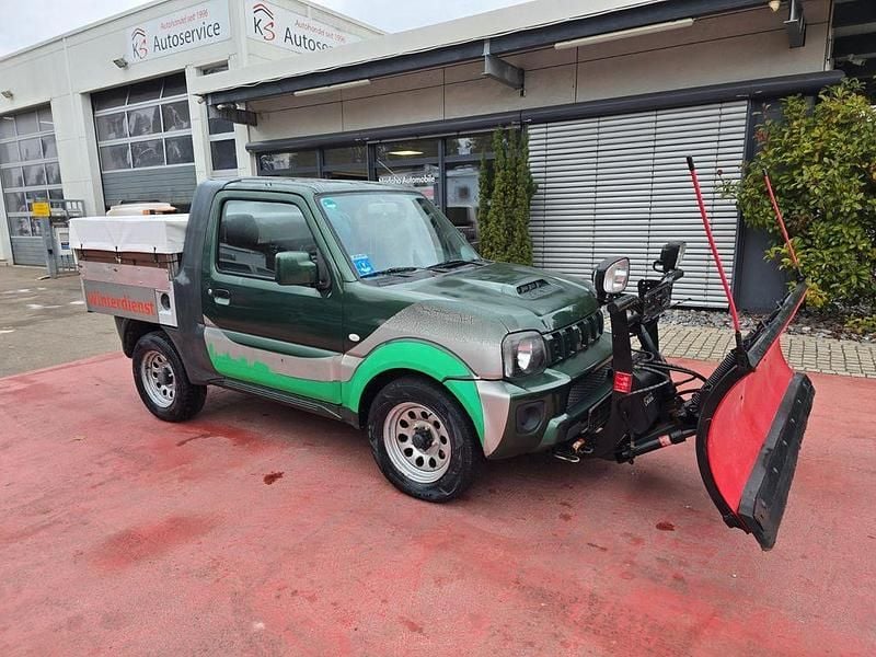 Grün Gebraucht 2014 Suzuki Jimny SUV | 15.999 € - Bild 1/4