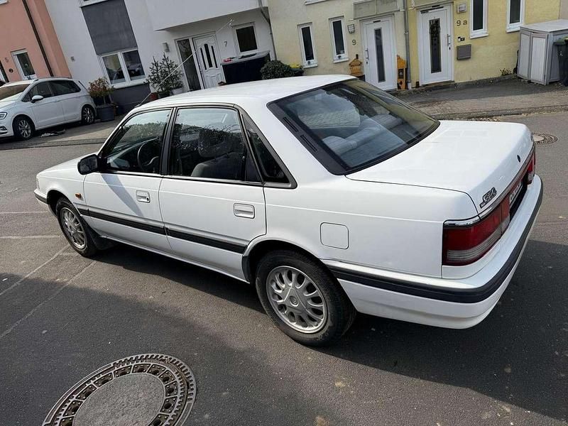 Second-hand Mazda 626 90 CP (66 kW) 1992 Alb Berlinǎ