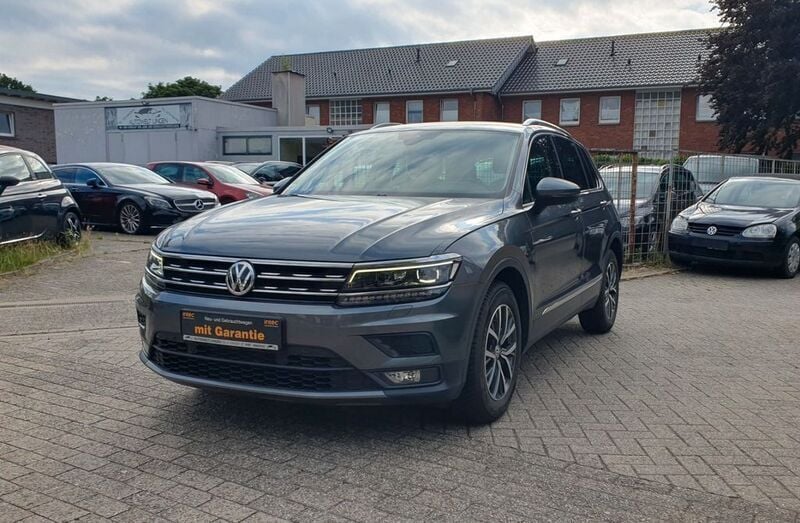 Grau Gebraucht 2020 VW Tiguan Comfortline SUV | 18.495 € (Fairer Preis) - Bild 1/4
