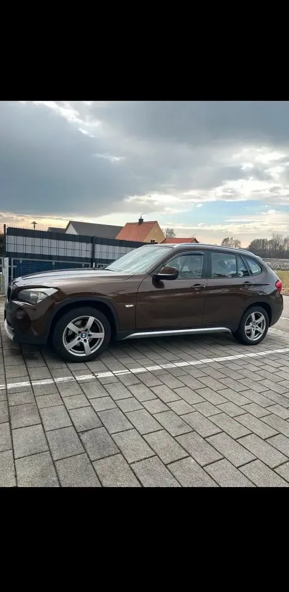 Używany BMW X1 177 KM (130 kW) 2012 Brązowy SUV