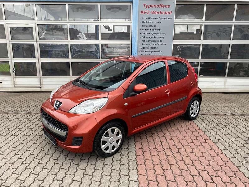 Gebraucht Peugeot 107 68 PS (50 kW) 2009 Orange Kleinwagen