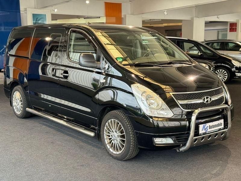 Schwarz Gebraucht 2012 Hyundai H-1 Premium Van / Kleinbus | 17.650 € (Fairer Preis) - Bild 1/4