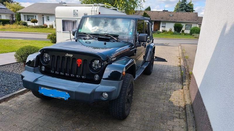Schwarz Gebraucht 2015 Jeep Wrangler Sahara SUV | 22.990 € (Superpreis) - Bild 1/4