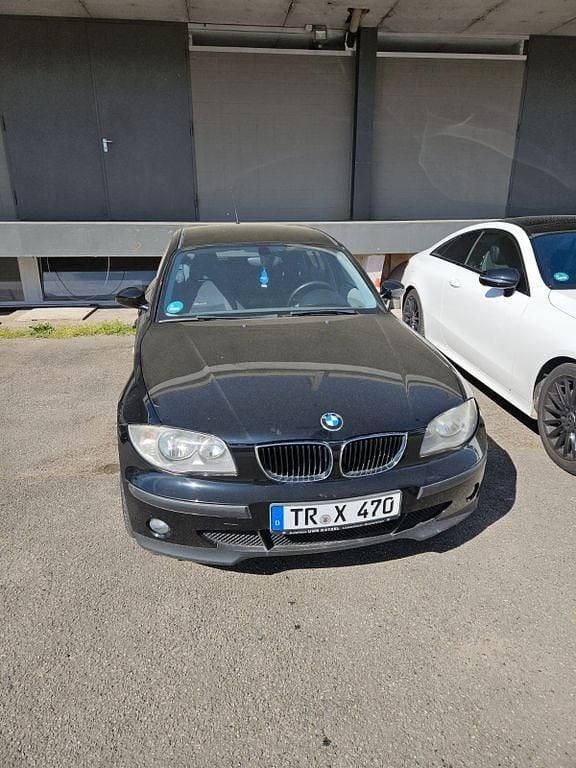 Second-hand BMW 116 122 CP (89 kW) 2004 Negru Hatchback