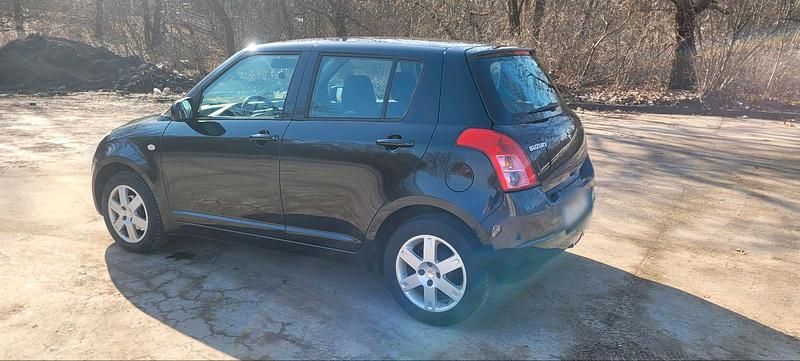 Gebraucht Suzuki Swift 92 PS (67 kW) 2010 Schwarz Kleinwagen