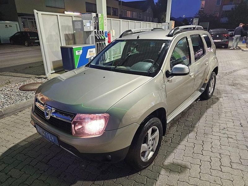 Grau Gebraucht 2012 Dacia Duster Ambiance SUV | 4.400 € (Fairer Preis) - Bild 1/4