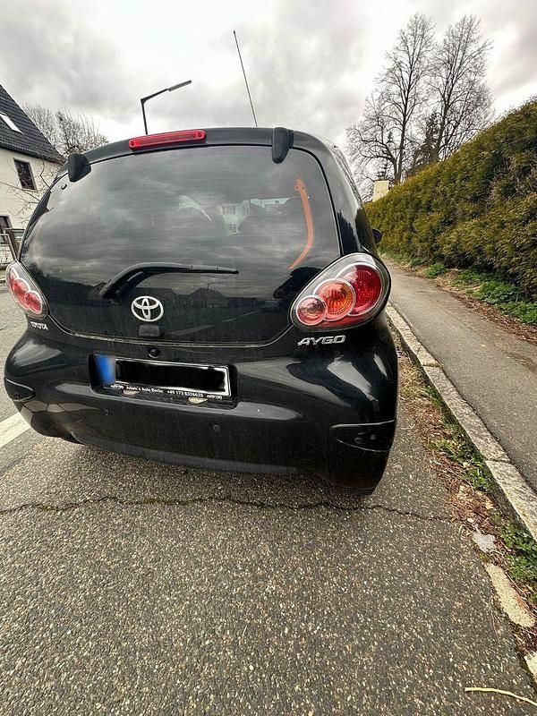 Gebraucht Toyota Aygo City 68 PS (50 kW) 2011 Schwarz Kleinwagen