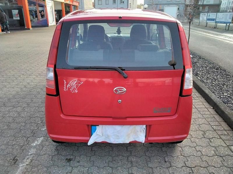 Gebraucht Daihatsu Cuore Plus 58 PS (42 kW) 2006 Rot Kleinwagen