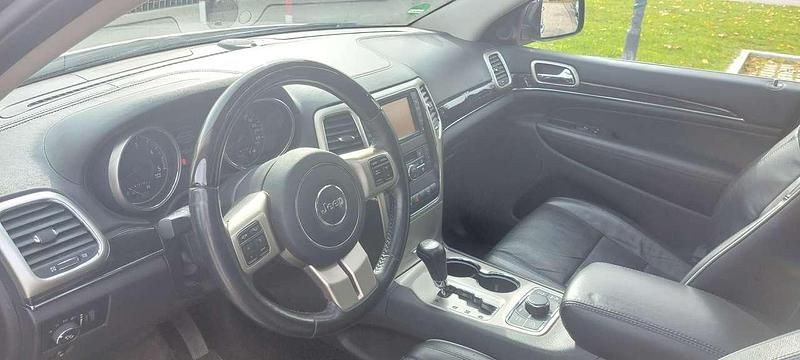 Grau Gebraucht 2012 Jeep Grand Cherokee Overland SUV | 10.500 € (Fairer Preis) - Bild 1/4