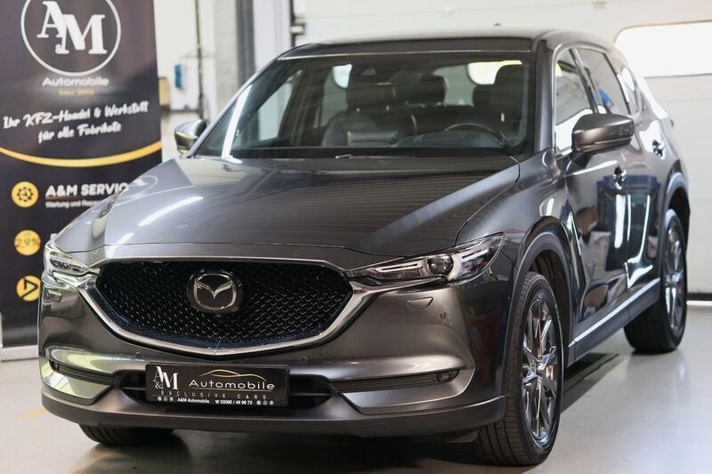 Machine gray (metallic) Gebraucht 2021 Mazda CX-5 Sports-Line SUV | 24.999 € (Superpreis) - Bild 1/3