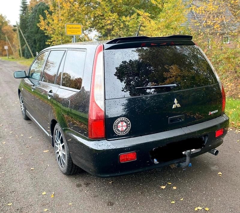 Schwarz Gebraucht 2003 Mitsubishi Lancer Kombi | 1.100 € (Fairer Preis) - Bild 1/4