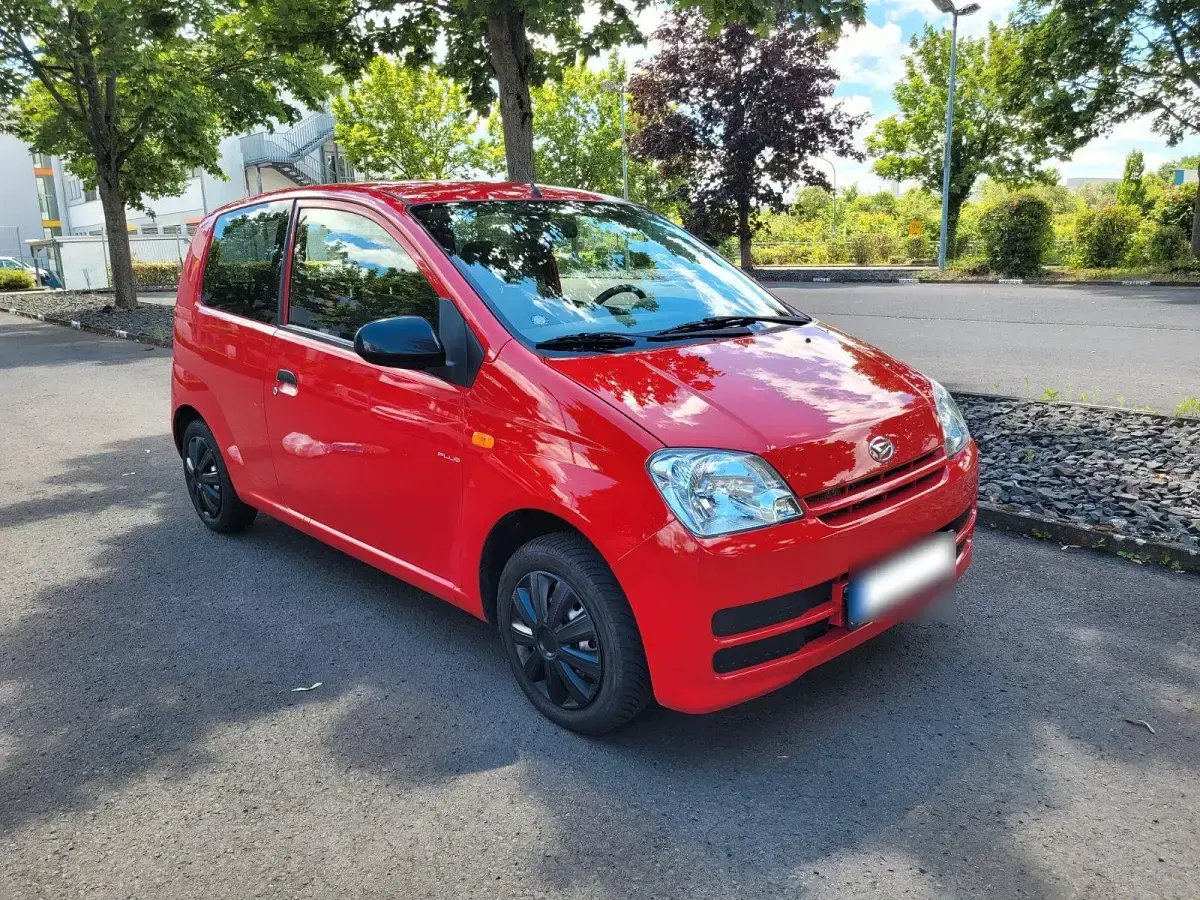 Gebraucht Daihatsu Cuore 58 PS (42 kW) 2006 Rot Kleinwagen