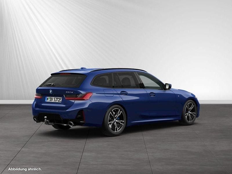 Gebraucht BMW 330e M Sport 292 PS (214 kW) 2024 Portimao blau metallic Kombi